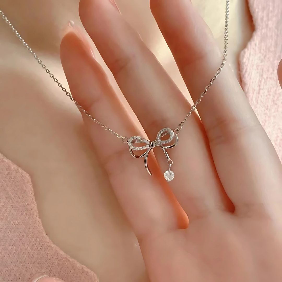 Elegant Bow Pendant Necklace with Diamond Accents