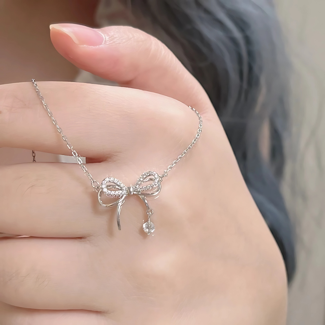 Elegant Bow Pendant Necklace with Diamond Accents