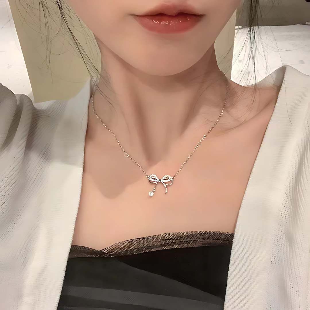 Elegant Bow Pendant Necklace with Diamond Accents