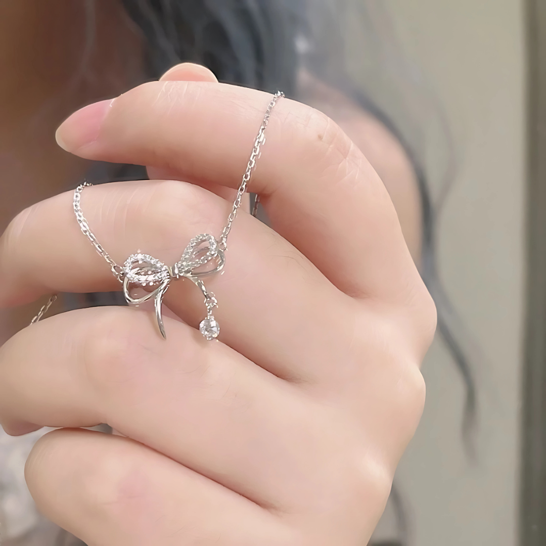 Elegant Bow Pendant Necklace with Diamond Accents