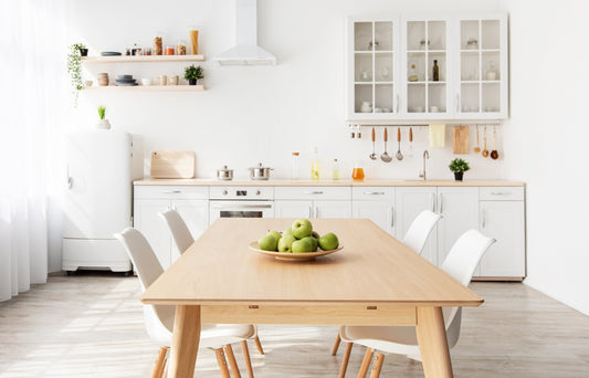 A peaceful, organized living space showing the results of Home Life Manila's one-item-a-day decluttering method with a donation box containing a single item, demonstrating how small daily habits lead to transformative home organization.