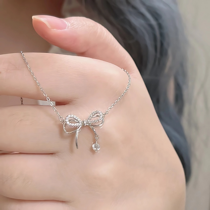 Elegant Bow Pendant Necklace with Diamond Accents