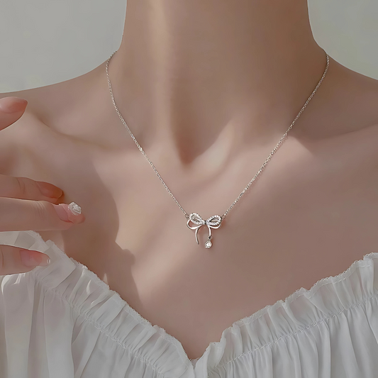 Elegant Bow Pendant Necklace with Diamond Accents
